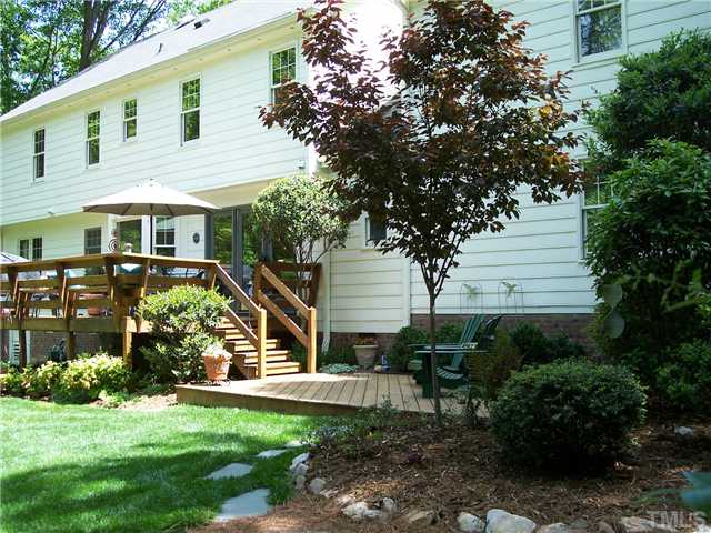 9321 Foxburrow Court Raleigh, NC 27613 - Photo 12 of 12 a view of a house with backyard and sitting area