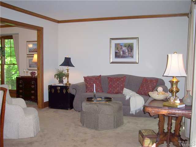 9321 Foxburrow Court Raleigh, NC 27613 - Photo 5 of 12 a living room with furniture