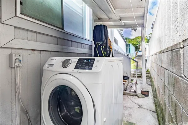a utility room with dryer and washer