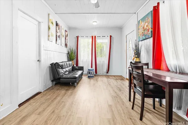 a living room with furniture and a window