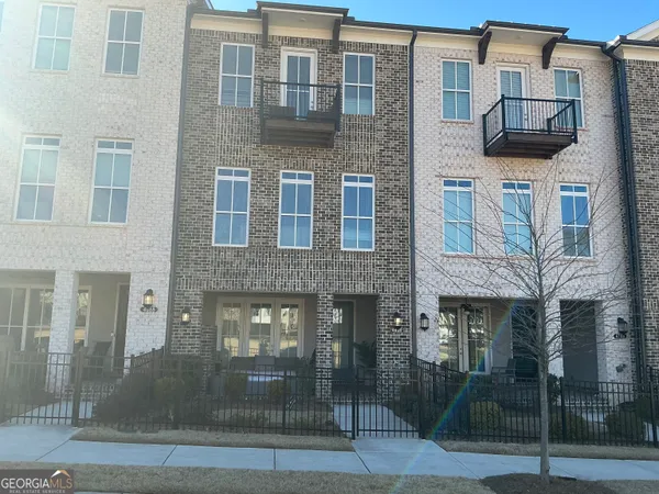 a front view of a building with glass windows