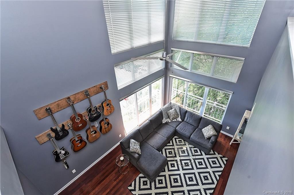 609 Raphael Place Charlotte, NC 28205 - Photo 14 of 36 a view of a living room with furniture and a window