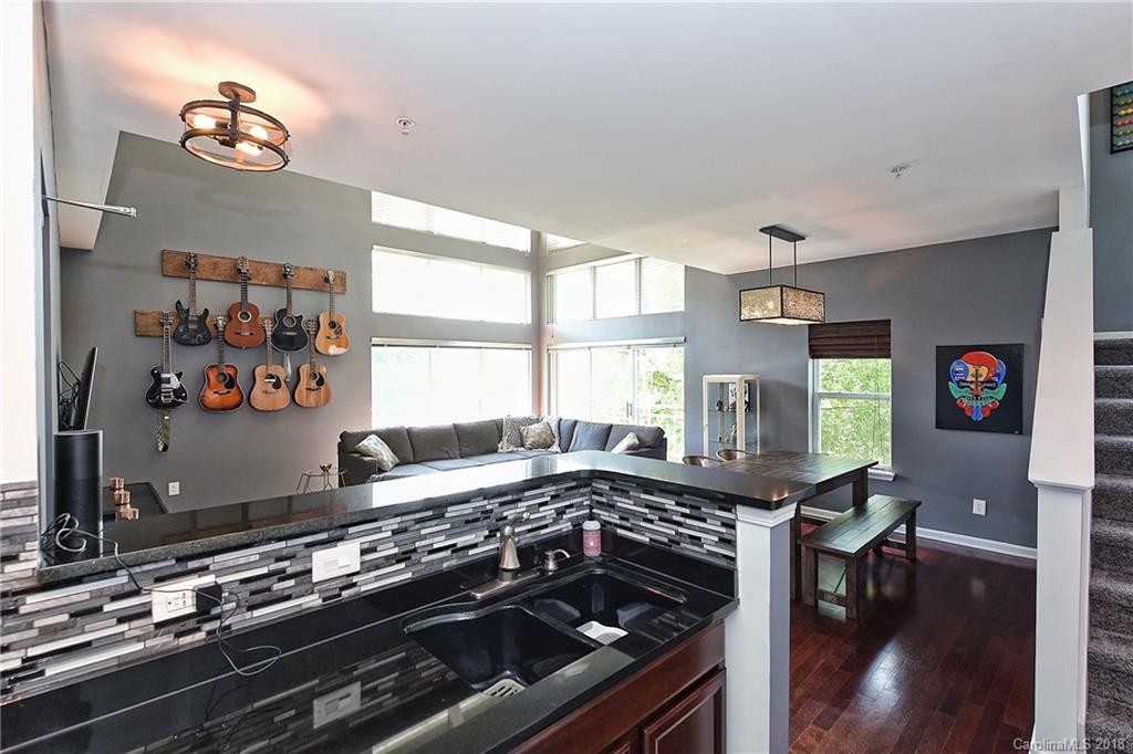 609 Raphael Place Charlotte, NC 28205 - Photo 19 of 36 a kitchen with a stove and a refrigerator