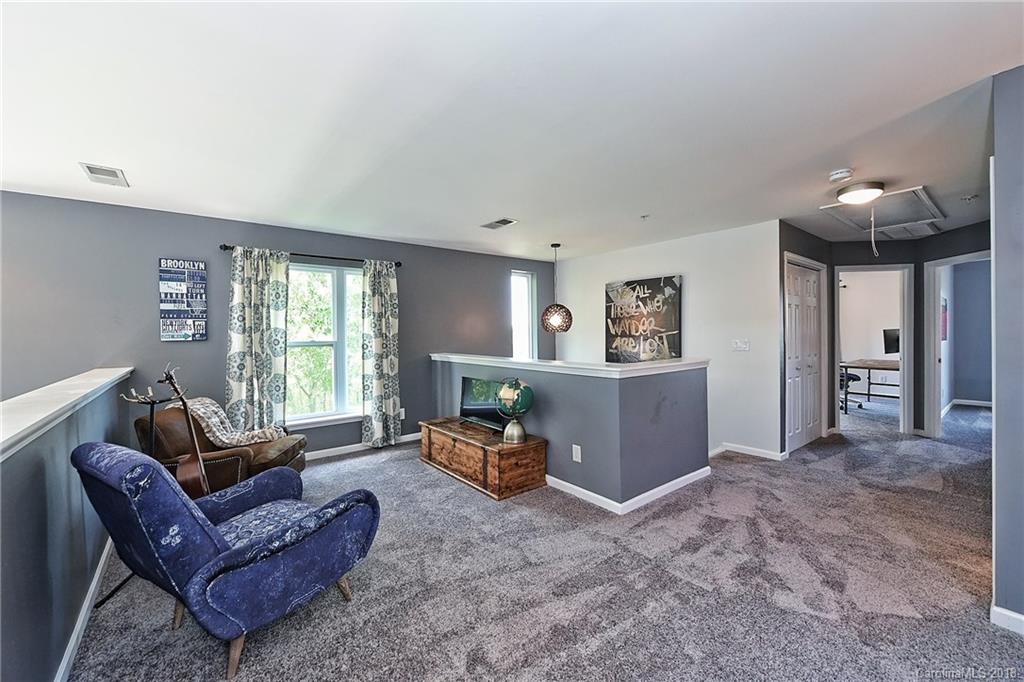 609 Raphael Place Charlotte, NC 28205 - Photo 28 of 36 a living room with furniture and a window