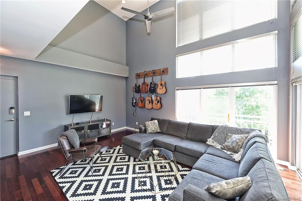 609 Raphael Place Charlotte, NC 28205 - Photo 6 of 36 a living room with furniture and a flat screen tv