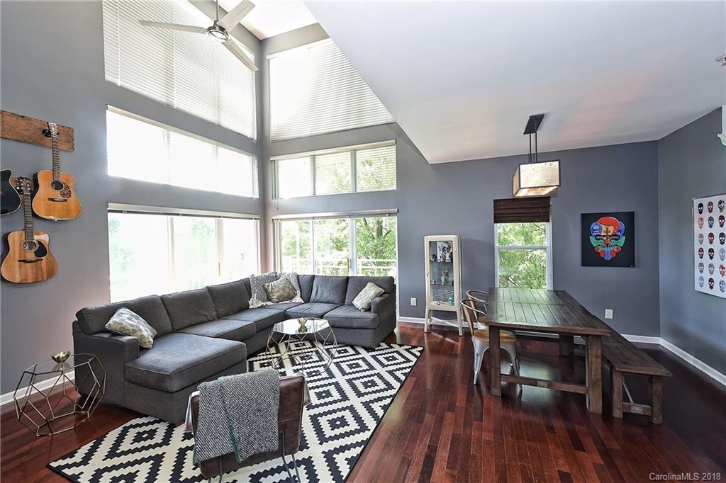 609 Raphael Place Charlotte, NC 28205 - Photo 9 of 36 a living room with furniture and a large window