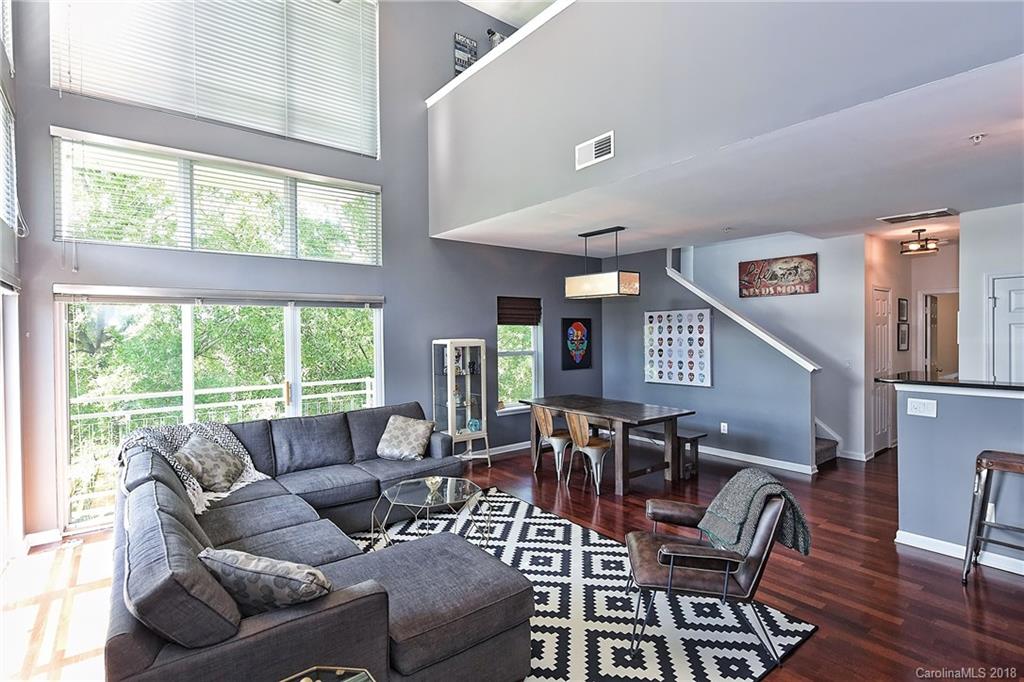 609 Raphael Place Charlotte, NC 28205 - Photo 10 of 36 a living room with furniture and a large window