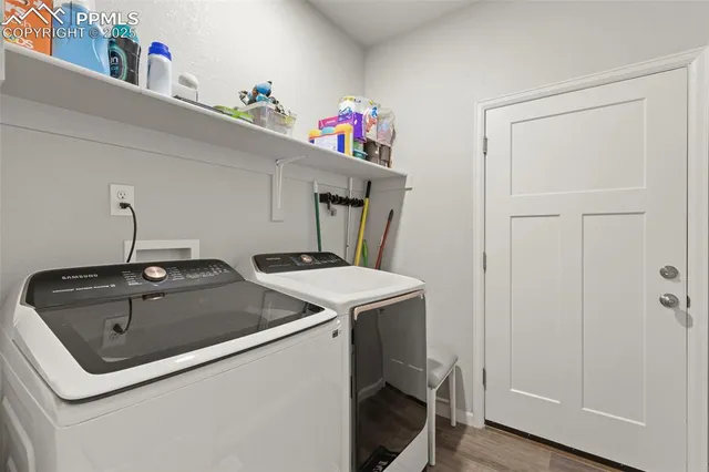 a utility room with dryer and washer