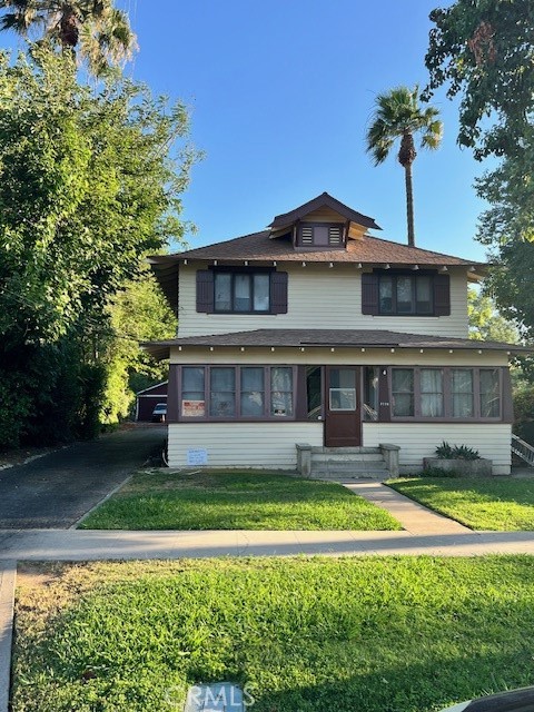 2726 5th Street Riverside, CA 92507 - Photo 1 of 1 a front view of a house with swimming pool