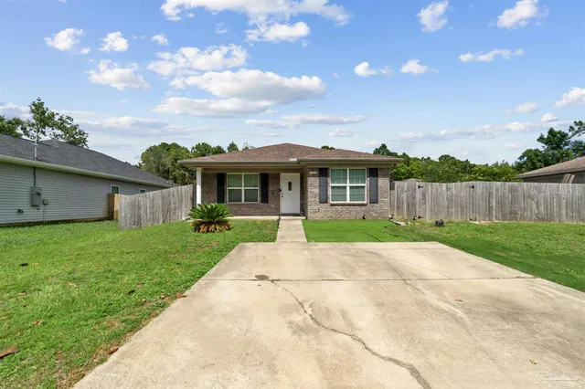 front view of house with a yard