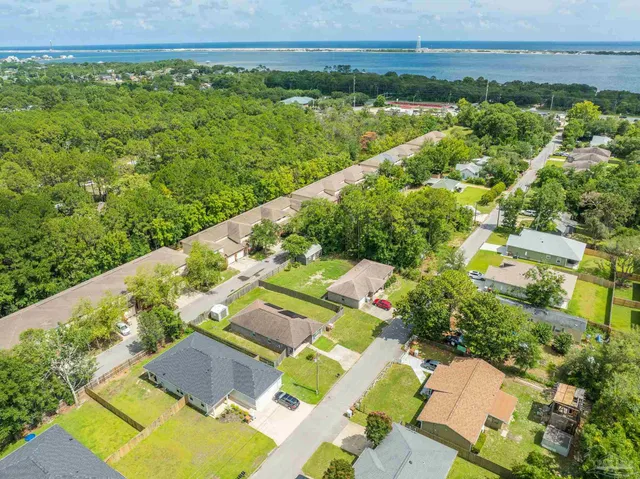 an aerial view of a house with a garden