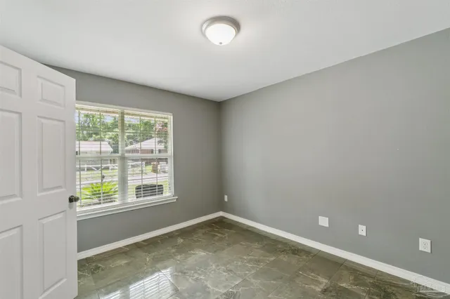 an empty room with a window