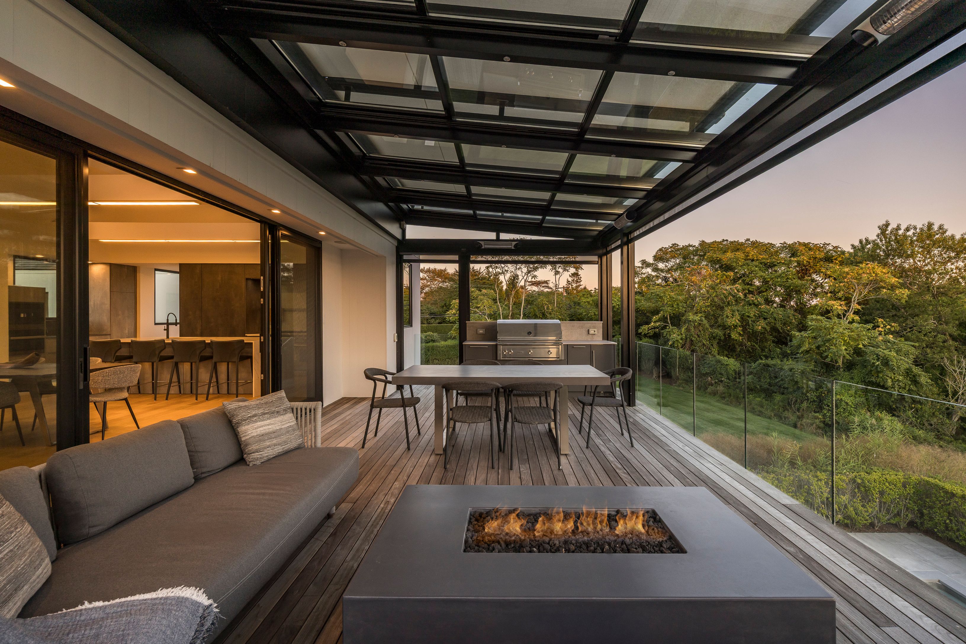 1076 Ocean Road Bridgehampton, NY 11932 - Photo 27 of 38 a outdoor dining space with furniture