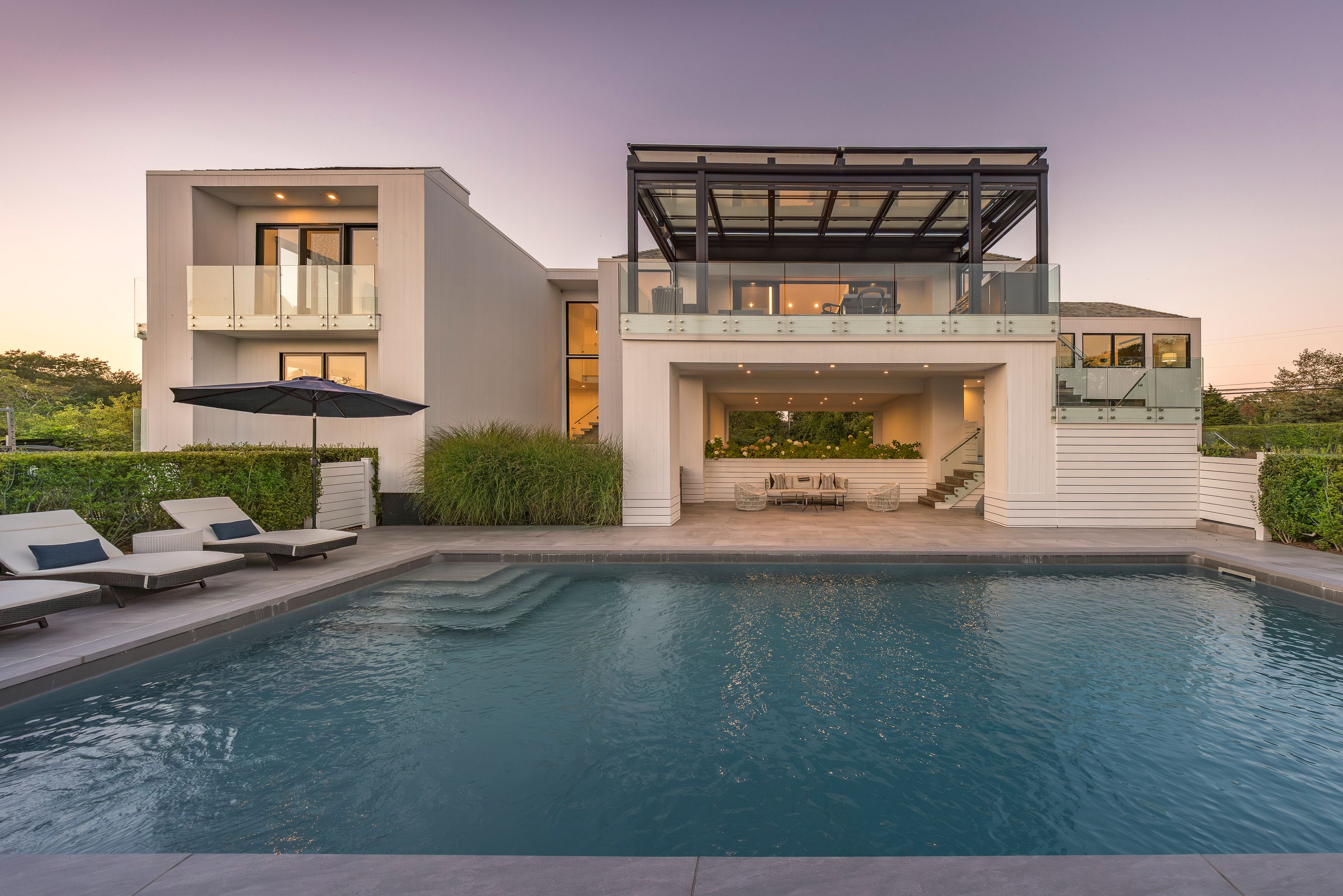 1076 Ocean Road Bridgehampton, NY 11932 - Photo 30 of 38 a view of a car park in front of house