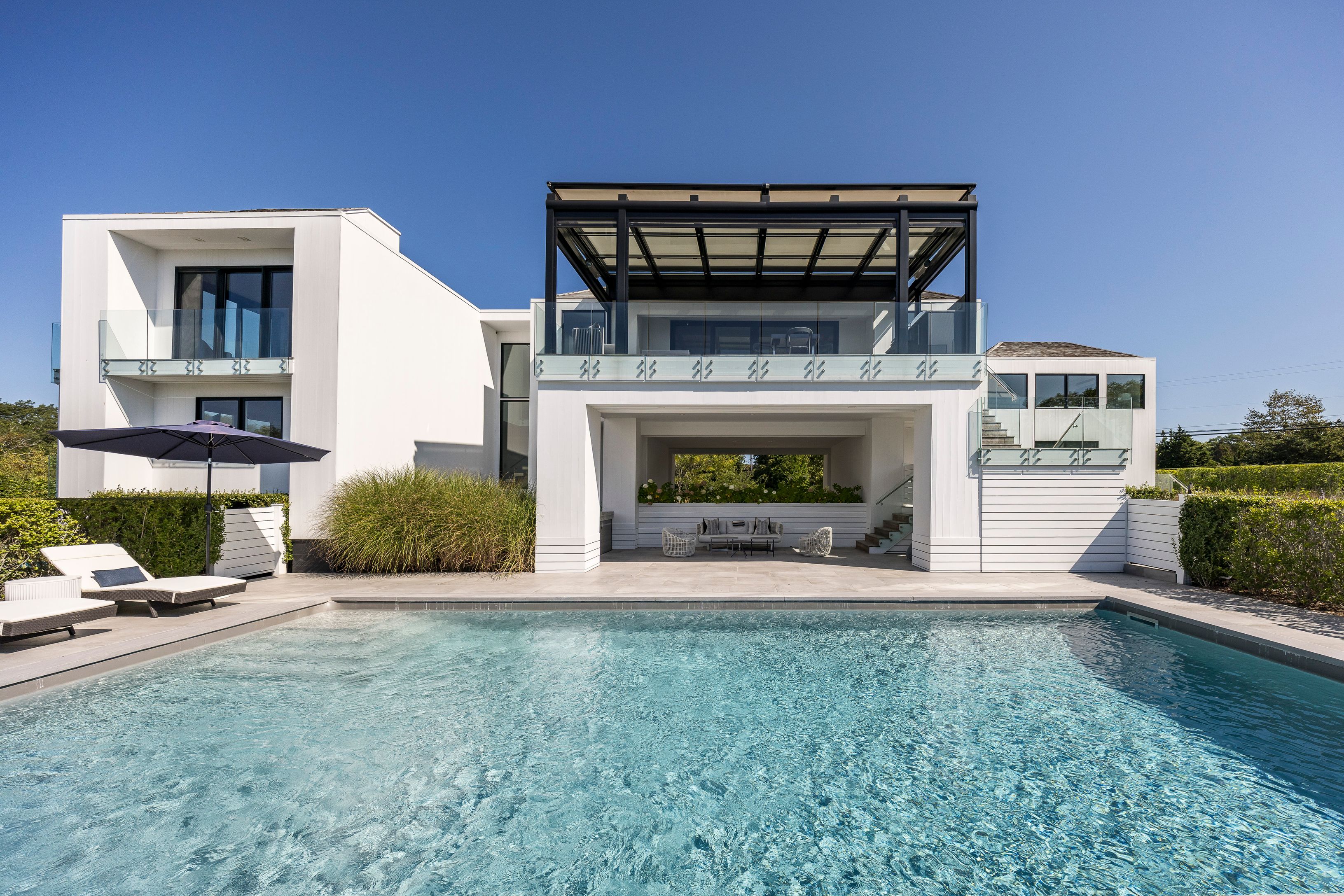 1076 Ocean Road Bridgehampton, NY 11932 - Photo 35 of 38 a view of living room with furniture and a fireplace