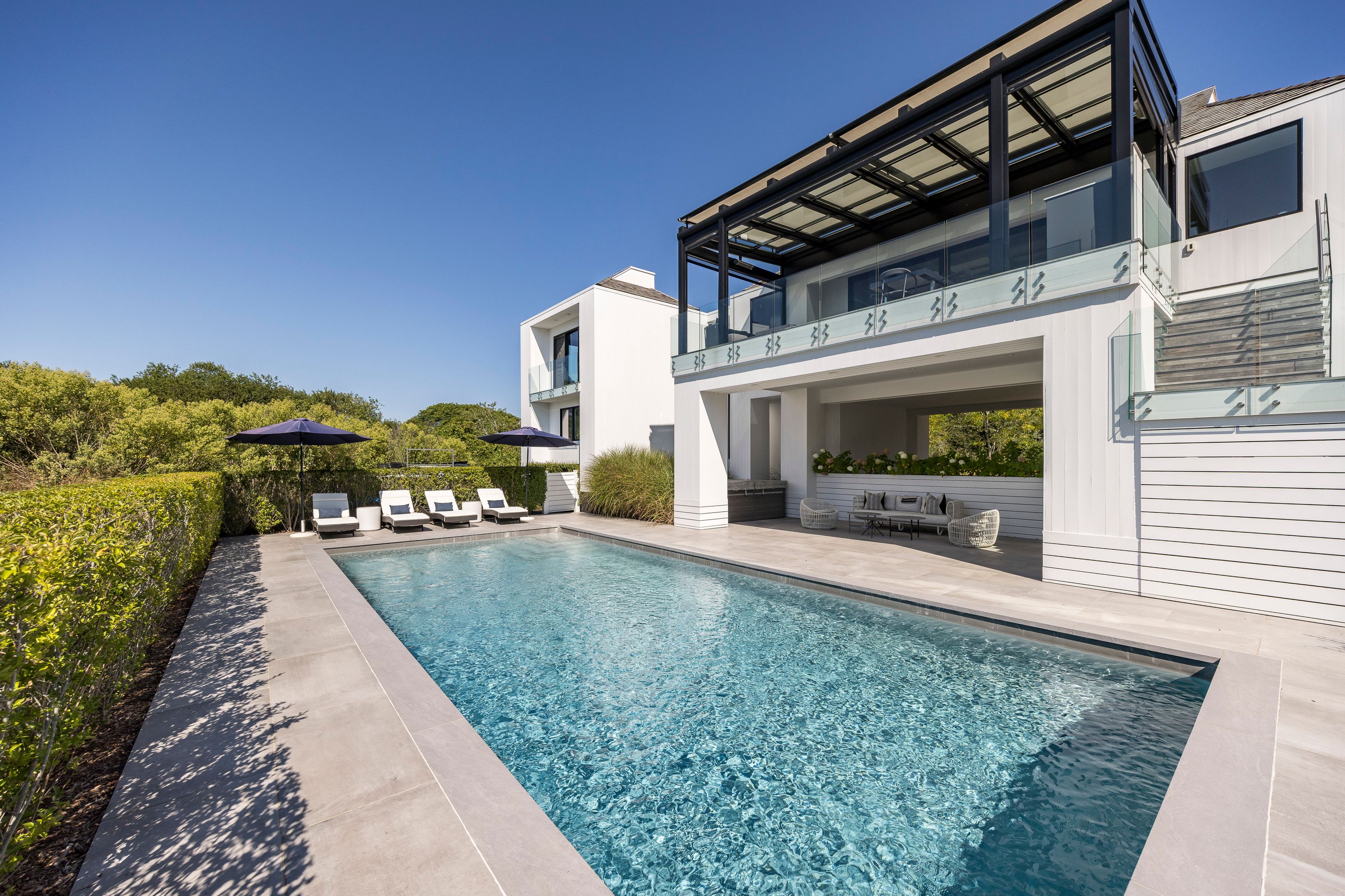 1076 Ocean Road Bridgehampton, NY 11932 - Photo 38 of 38 a house view with a outdoor space