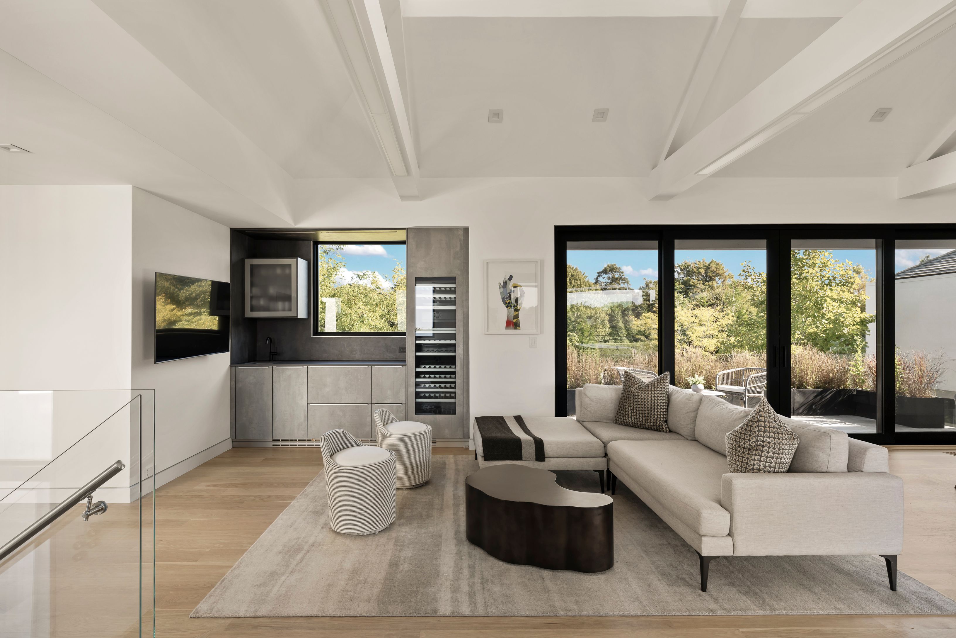 1076 Ocean Road Bridgehampton, NY 11932 - Photo 9 of 38 a living room with furniture and a large window