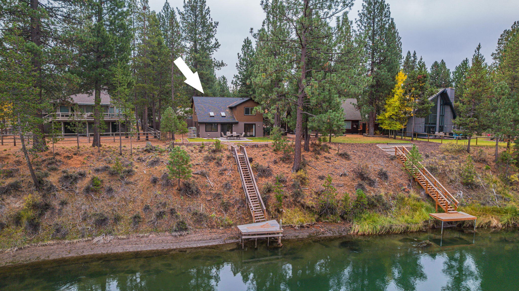 56019 Snow Goose Road Bend, OR 97707 - Photo 9 of 32 a aerial view of a house with a yard basket ball court and outdoor seating