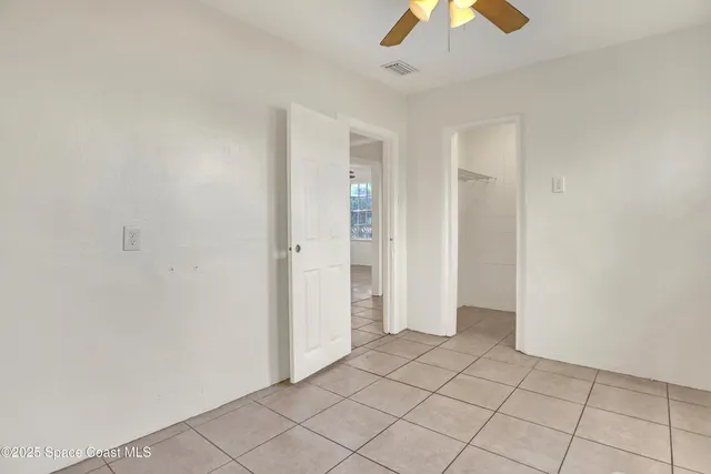 a view of a glass door and a window