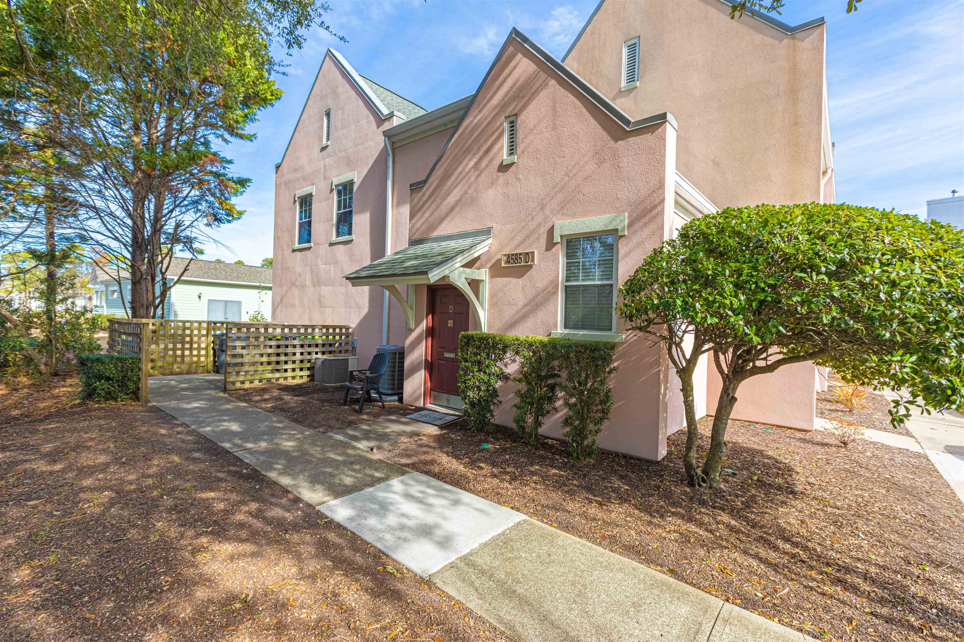 Traditional-style home with stucco siding
