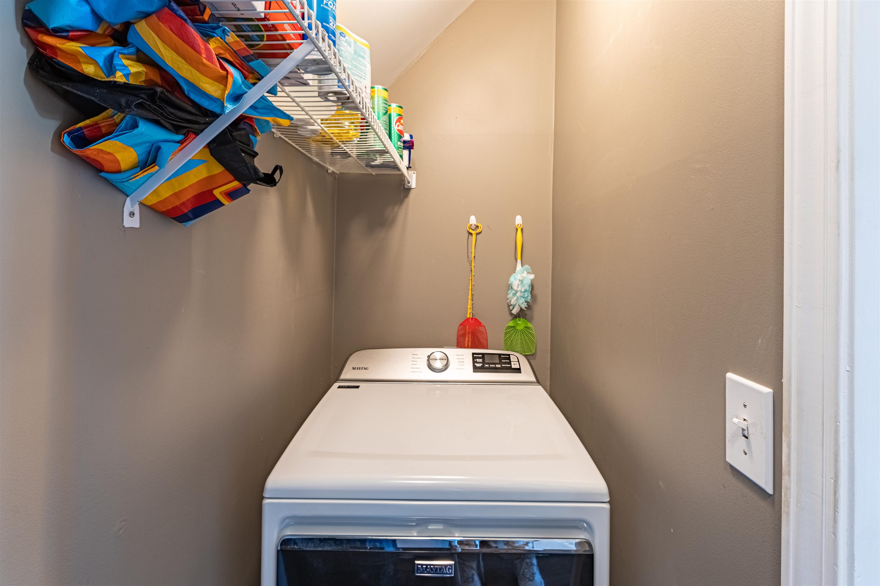 4585 Girvan Drive, Unit D Myrtle Beach, SC 29579 - Photo 20 of 32 Laundry area with washer / dryer