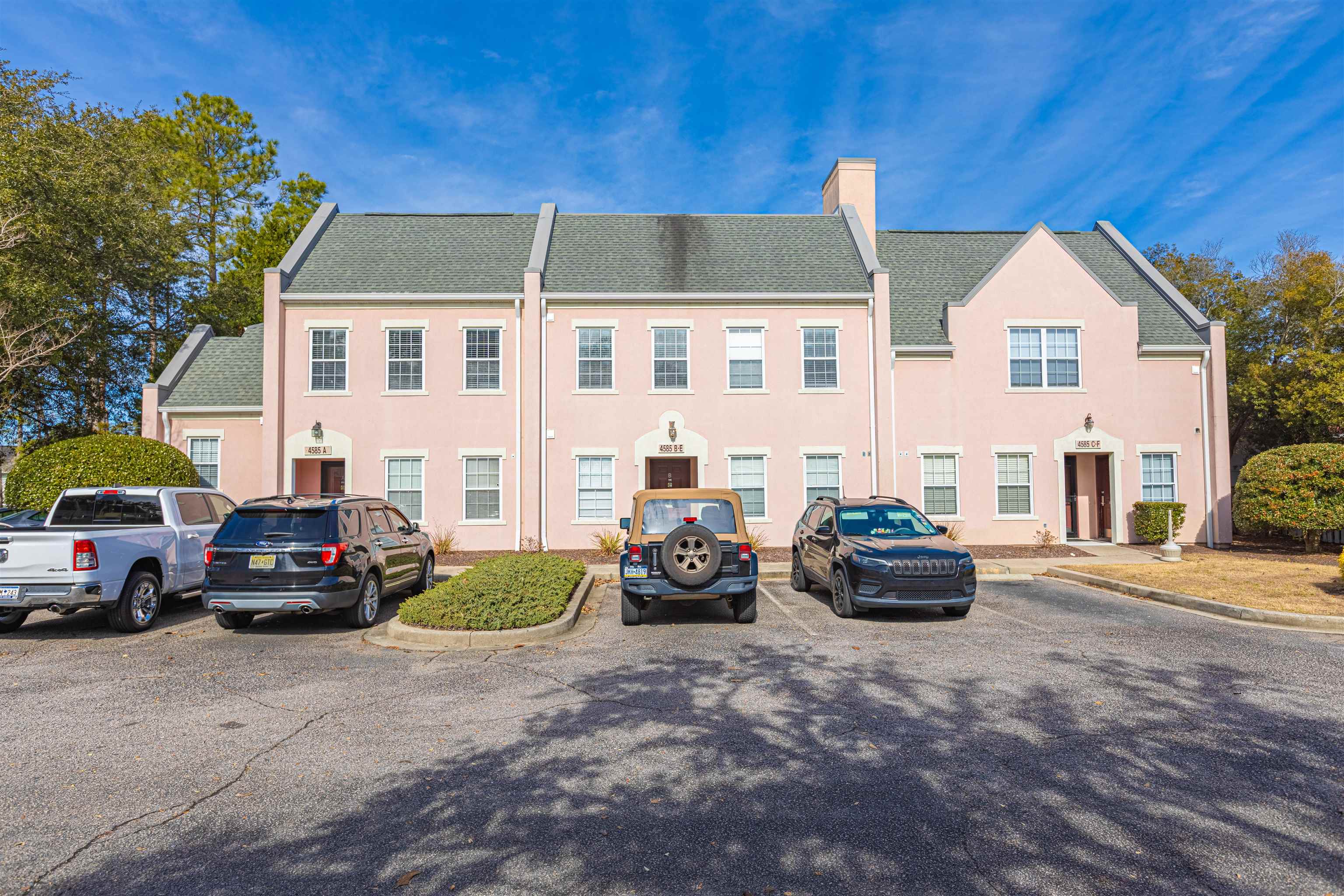 4585 Girvan Drive, Unit D Myrtle Beach, SC 29579 - Photo 21 of 32 View of property with uncovered parking