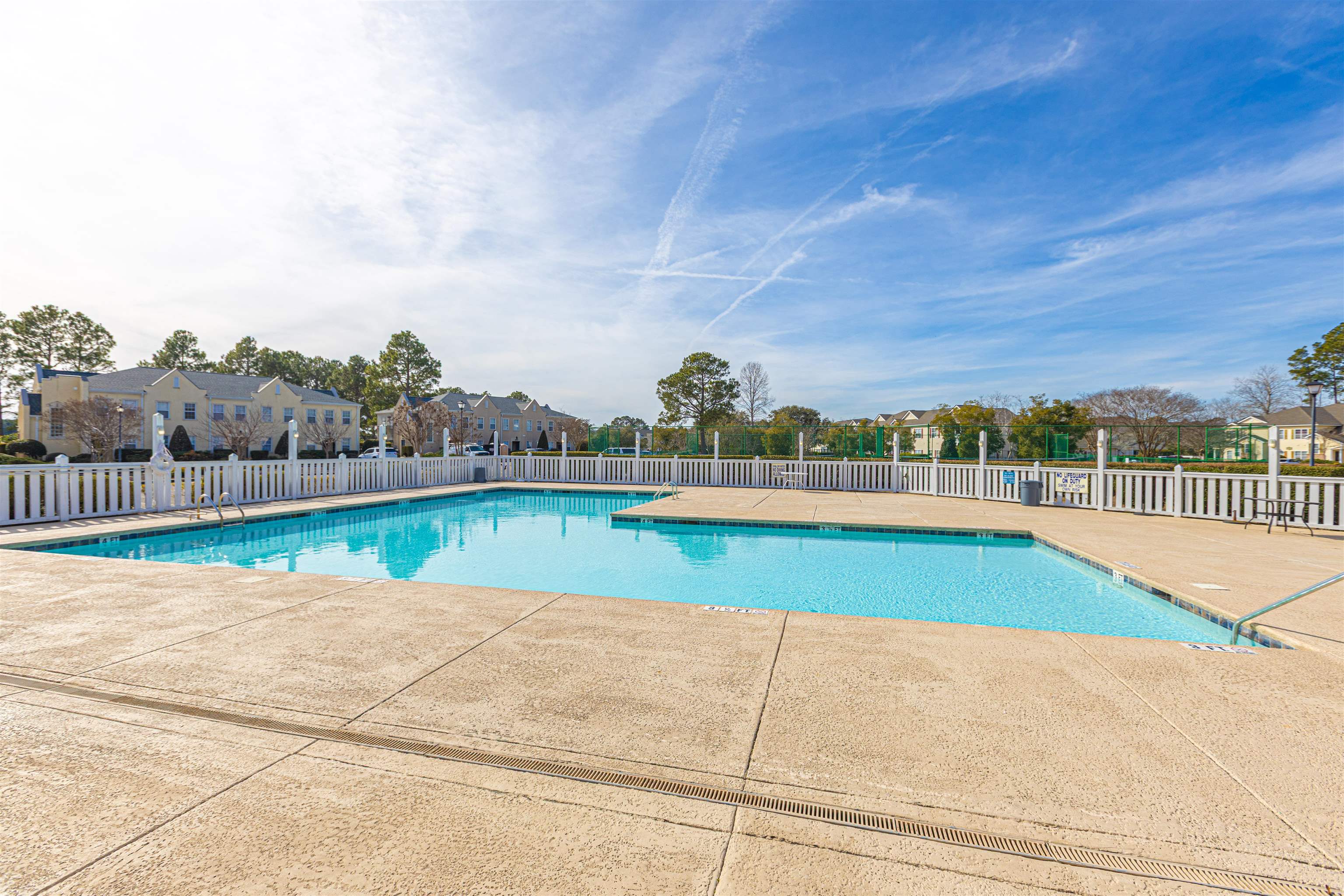 4585 Girvan Drive, Unit D Myrtle Beach, SC 29579 - Photo 23 of 32 Community pool with a patio and a residential view