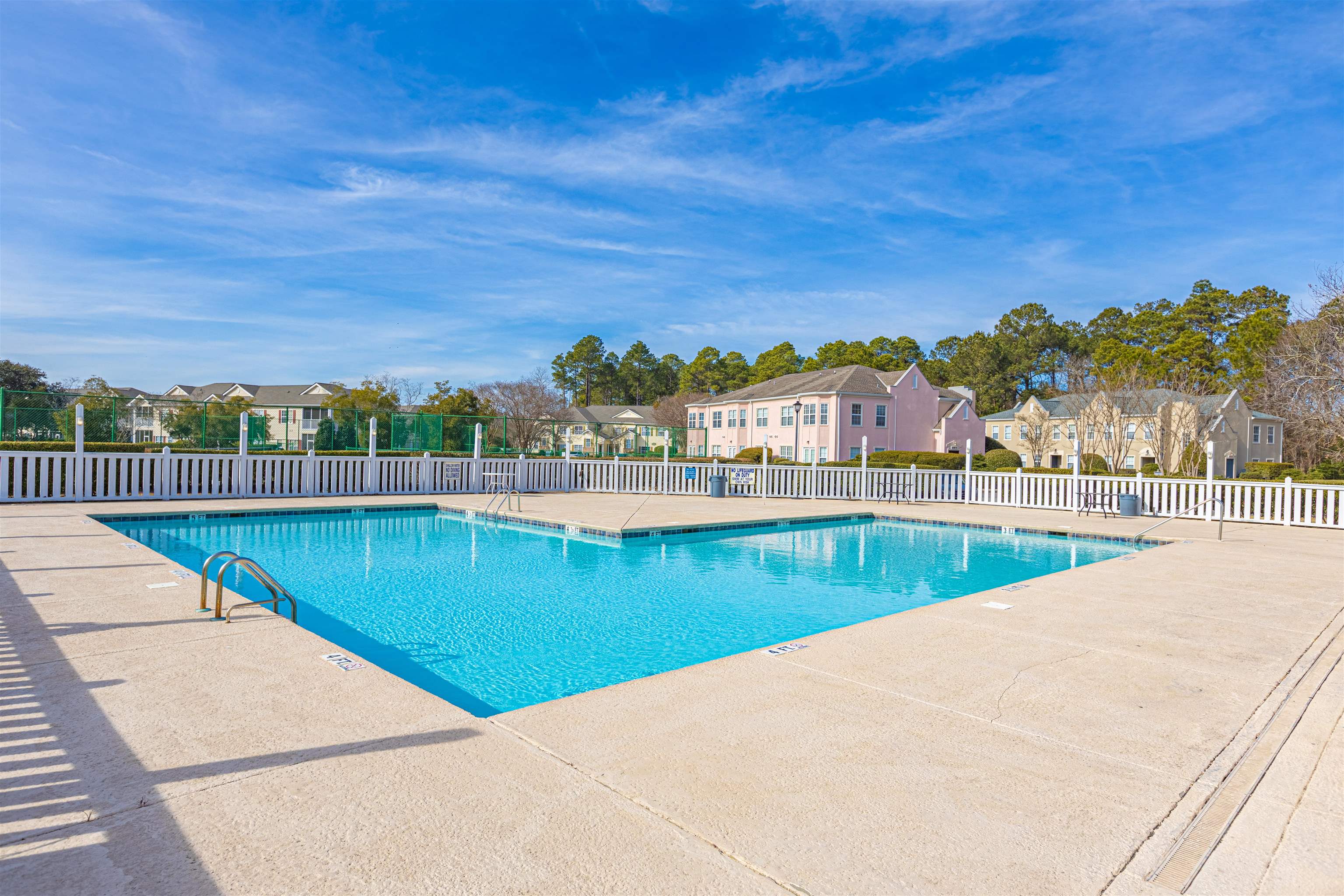 4585 Girvan Drive, Unit D Myrtle Beach, SC 29579 - Photo 24 of 32 Community pool with a residential view and a patio