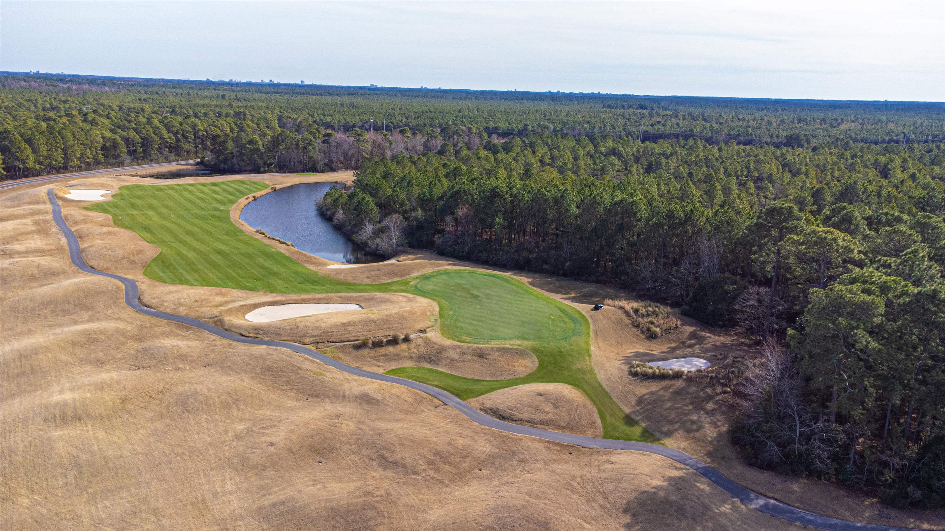 4585 Girvan Drive, Unit D Myrtle Beach, SC 29579 - Photo 26 of 32 Bird's eye view of a nearby body of water and a golf course