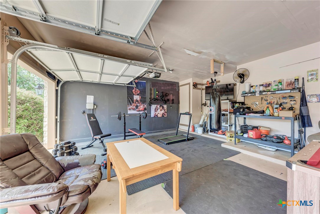 700 Cortona Cove Georgetown, TX 78628 - Photo 28 of 46 Garage