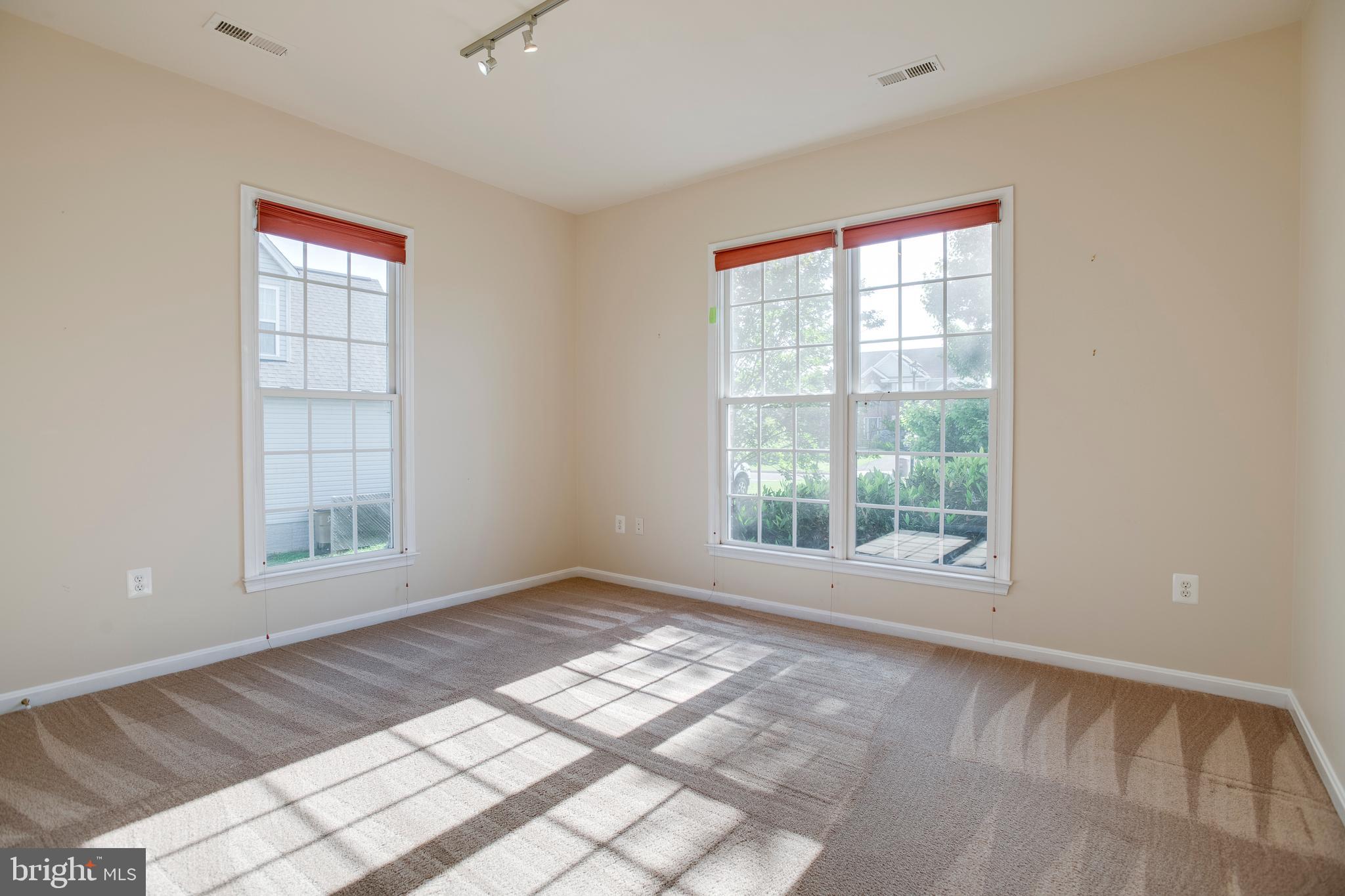 14308 South Hall Court Culpeper, VA 22701 - Photo 32 of 78 a view of an empty room with a window