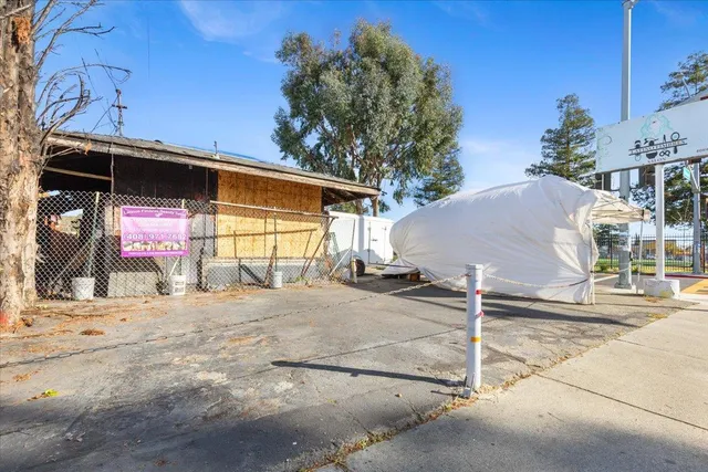 a house view with a backyard space