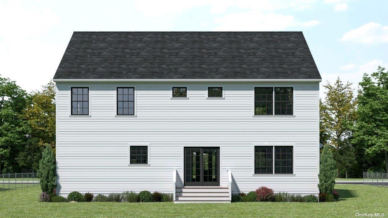 106 Schoolhouse Road East Islip, NY 11730 - Photo 11 of 26 a front view of a house with a yard