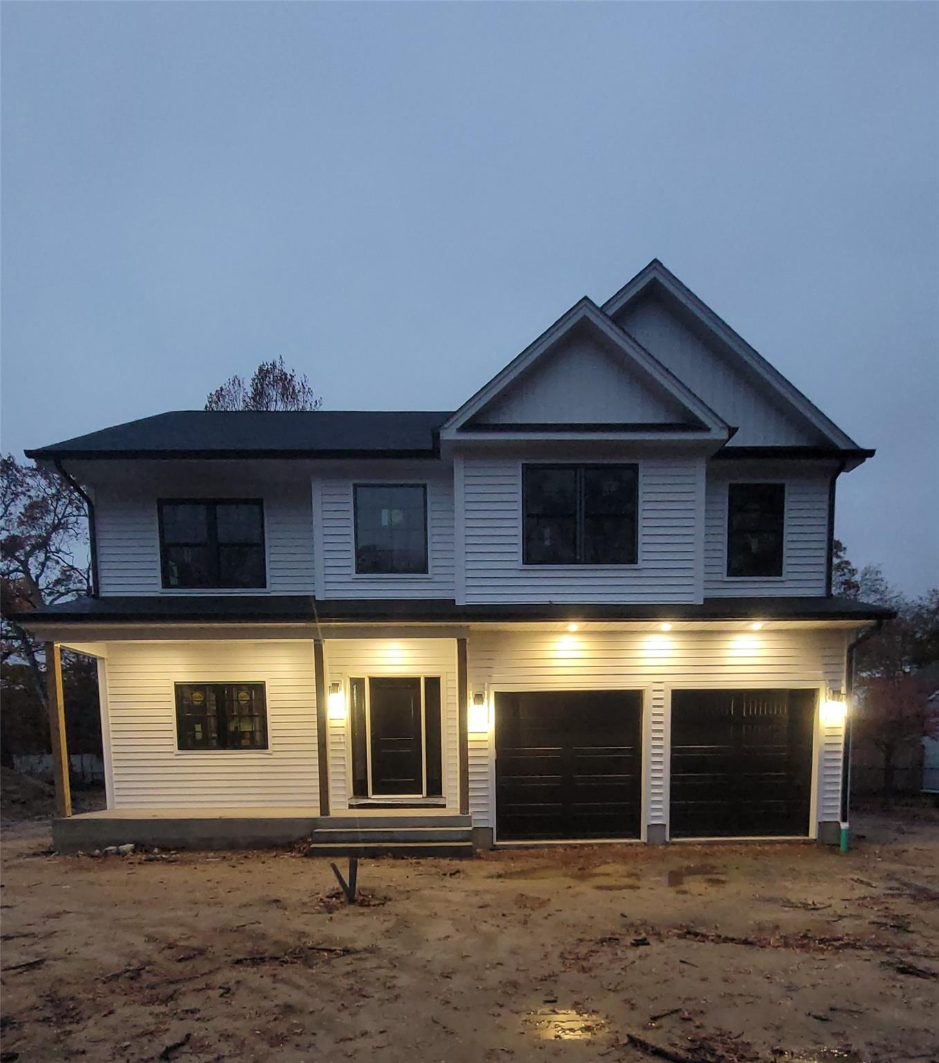 106 Schoolhouse Road East Islip, NY 11730 - Photo 2 of 26 a front view of a house with yard
