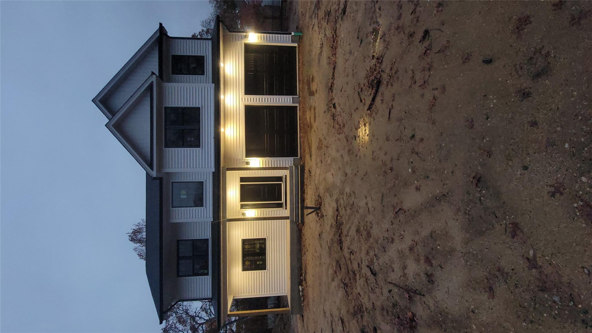 106 Schoolhouse Road East Islip, NY 11730 - Photo 24 of 26 a view of front of house with yard