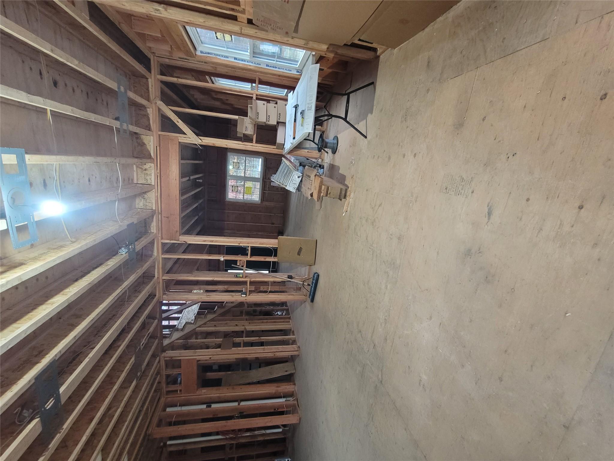 106 Schoolhouse Road East Islip, NY 11730 - Photo 9 of 26 a view of a room with gym equipment