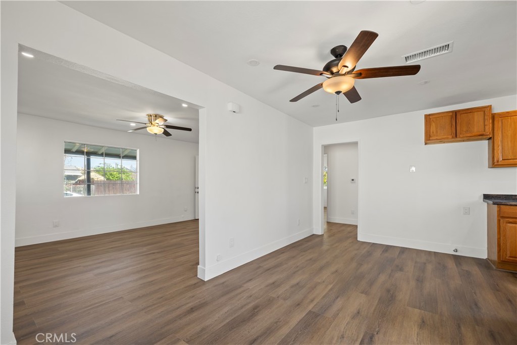605 West 1st Street Azusa, CA 91702 - Photo 15 of 38 an empty room with wooden floor closet and windows