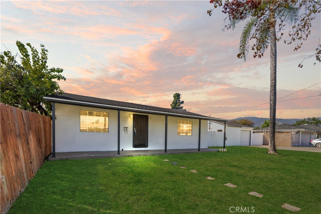 605 West 1st Street Azusa, CA 91702 - Photo 2 of 38 a view of a backyard with a garden and plants