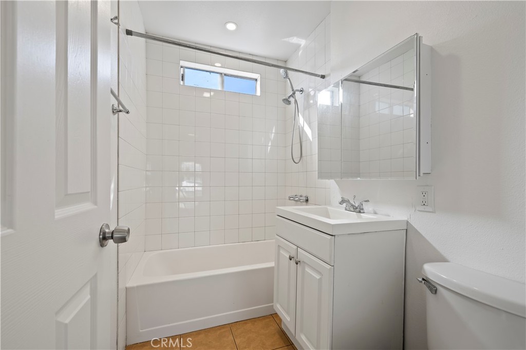 605 West 1st Street Azusa, CA 91702 - Photo 24 of 38 a bathroom with a sink toilet tub and shower