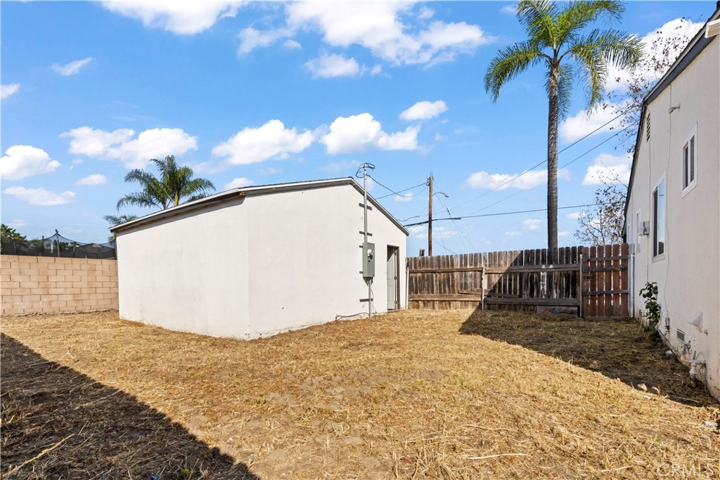 605 West 1st Street Azusa, CA 91702 - Photo 26 of 38 a view of a white house with a snow in the background