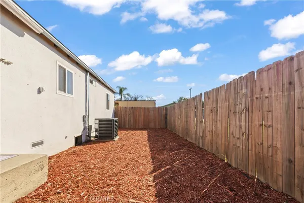 a view of a backyard of the house