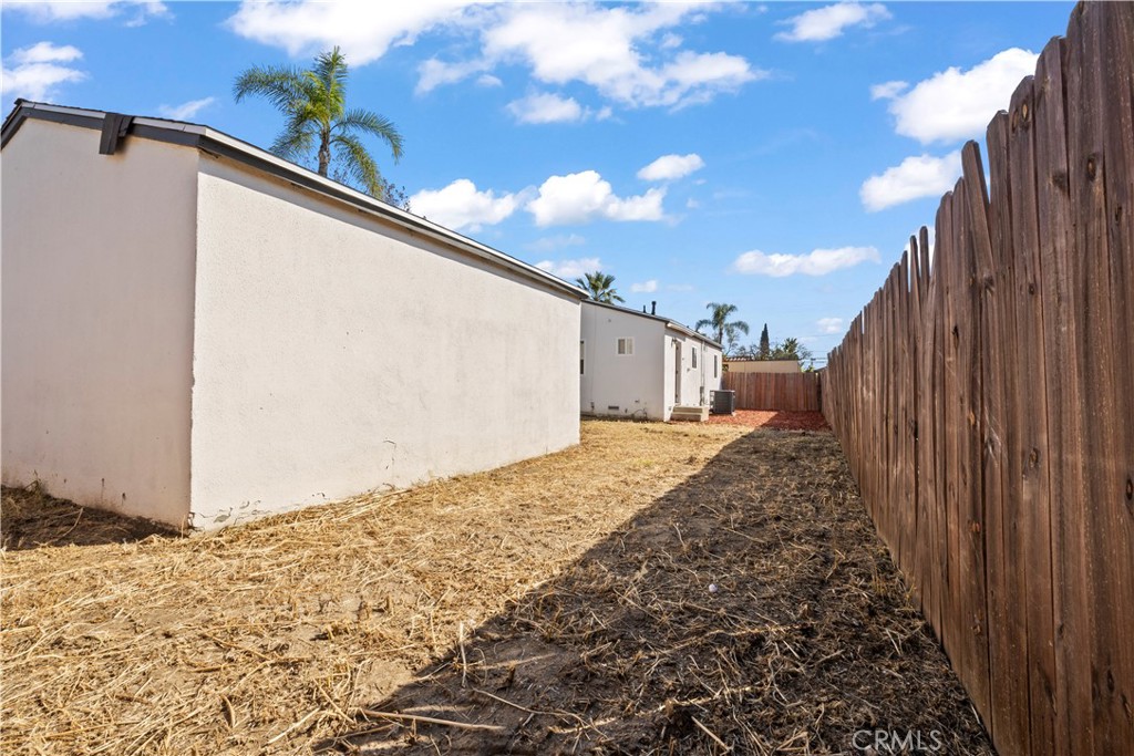 605 West 1st Street Azusa, CA 91702 - Photo 31 of 38 a view of the back yard of the house and wooden floor