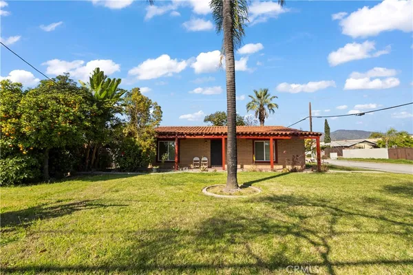 a view of a house with a swimming pool