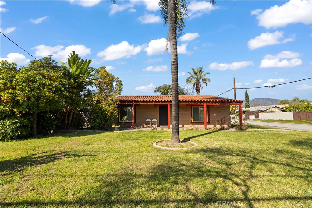 605 West 1st Street Azusa, CA 91702 - Photo 5 of 38 a view of a house with a swimming pool