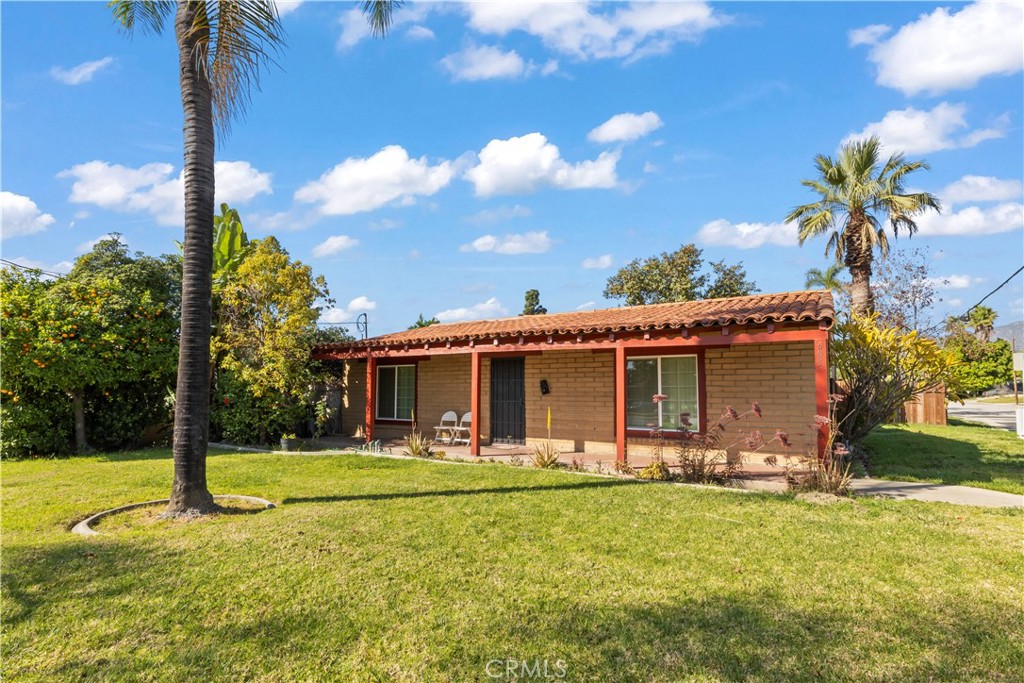 605 West 1st Street Azusa, CA 91702 - Photo 7 of 38 a front view of house with yard and green space