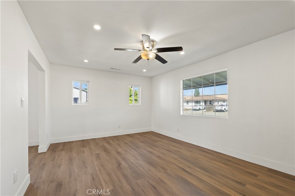 605 West 1st Street Azusa, CA 91702 - Photo 10 of 38 wooden floor in an empty room with a window
