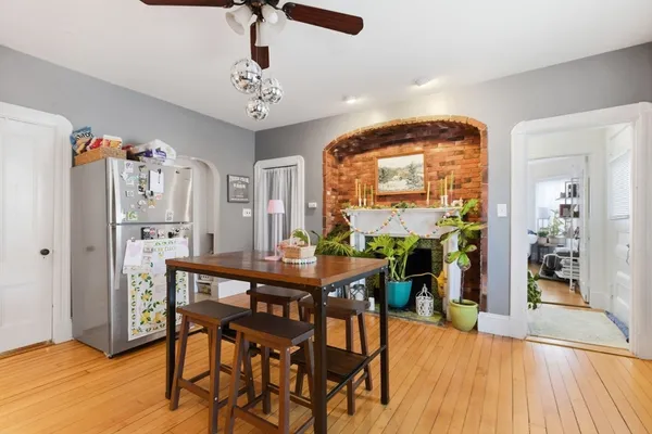 a bedroom with two beds and a window