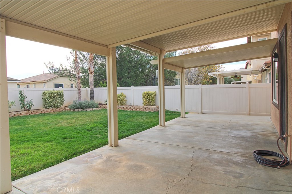 1637 Rigel Street Beaumont, CA 92223 - Photo 22 of 22 a view of a porch with a yard