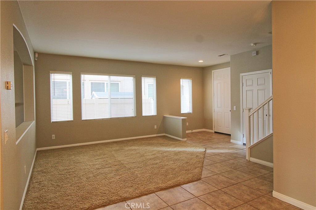 1637 Rigel Street Beaumont, CA 92223 - Photo 5 of 22 a view of an empty room and window