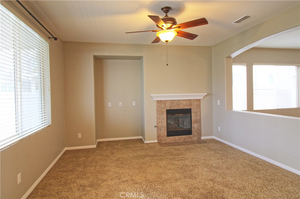 1637 Rigel Street Beaumont, CA 92223 - Photo 10 of 22 a view of an empty room with a window